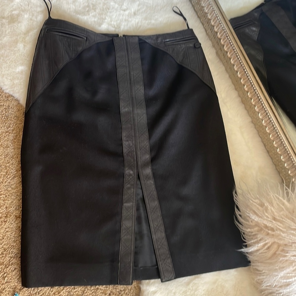 Chanel black skirt.